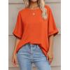 imageATHMILE Womens Oversized T Shirts Summer Tops Spring Casual Loose Fit Workout Short Sleeve 2026 Beach VacationOrange